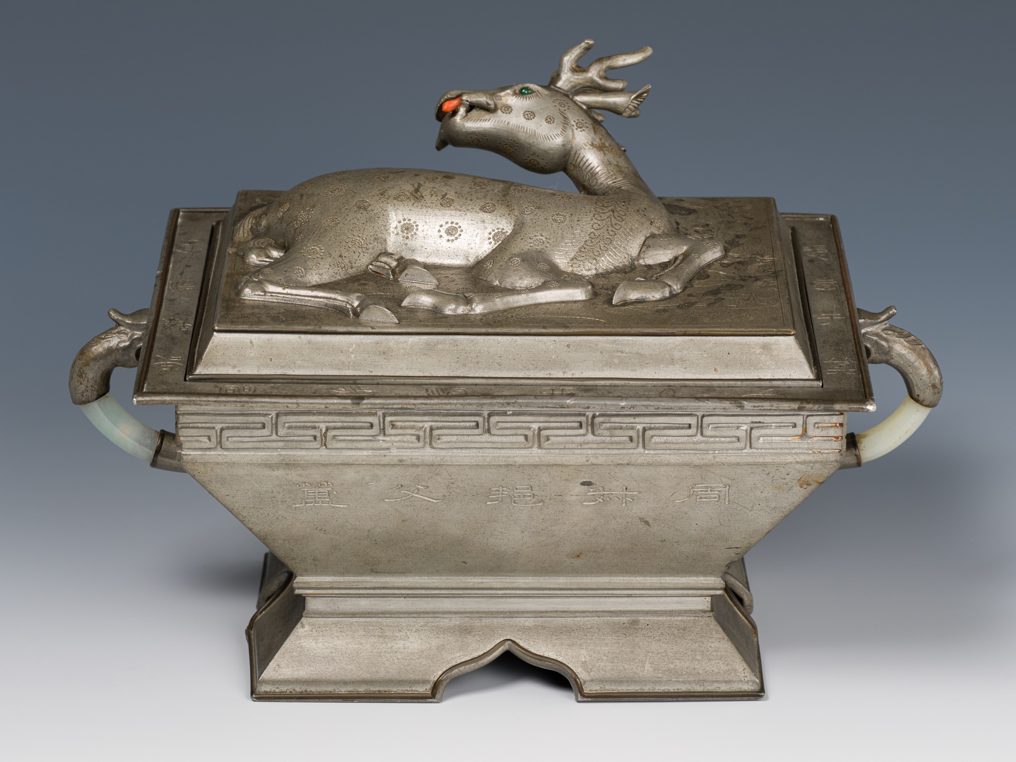 A JADE-INLAID PEWTER 'DEER WITH LINGZHI' ARCHAISTIC VESSEL AND COVER, FU, QING DYNASTY
