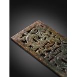 A RECTANGULAR GREEN JADE 'DOUBLE DRAGON' PLAQUE, LATE WARRING STATES PERIOD TO EARLY WESTERN HAN DYN