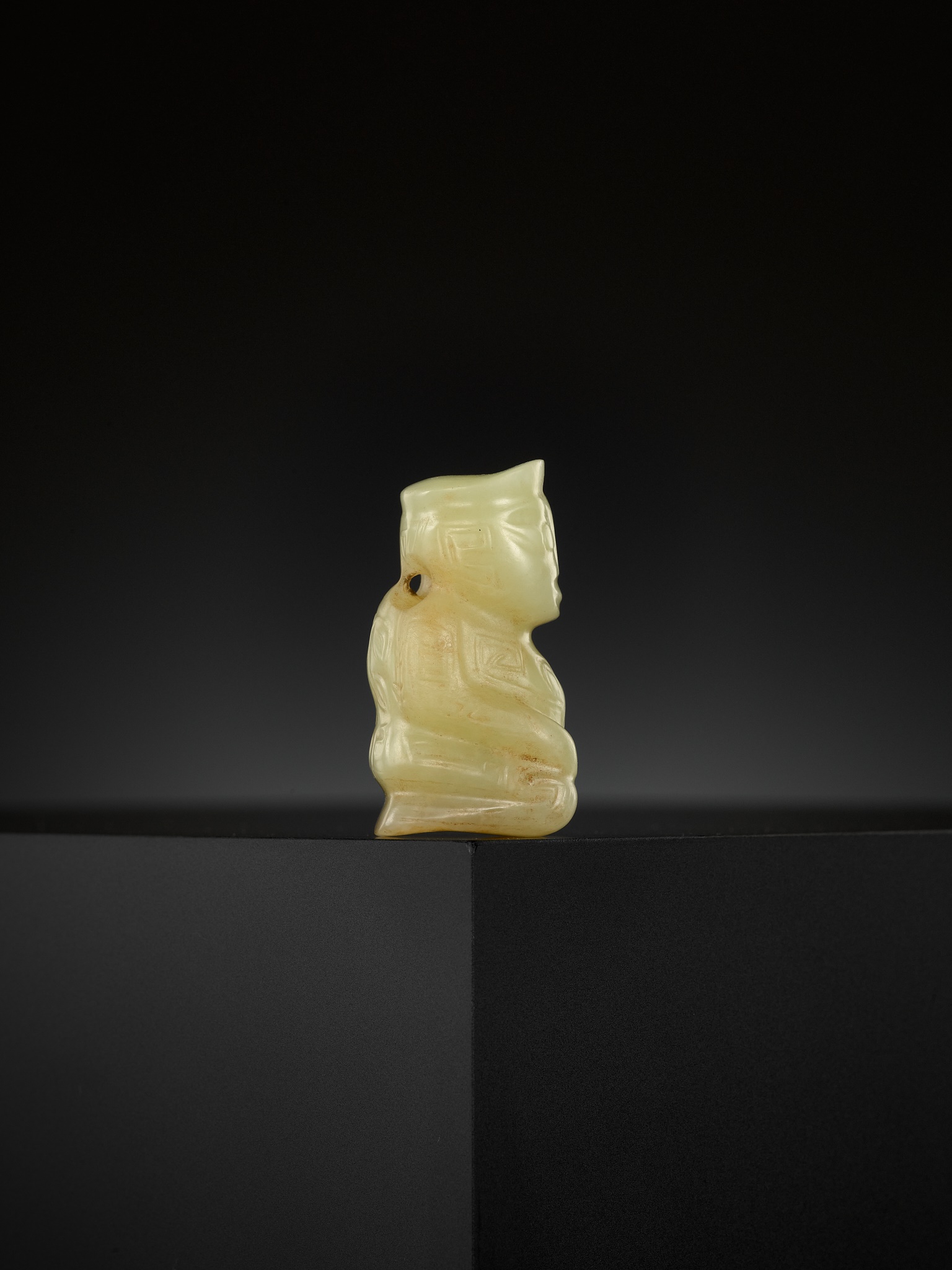 AN EXTREMELY RARE YELLOW JADE 'KNEELING FIGURE', SHANG DYNASTY - Image 16 of 20