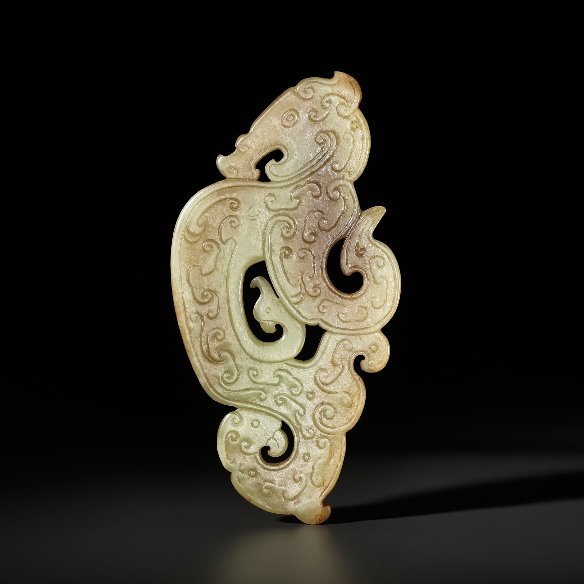 AN ARCHAISTIC YELLOW JADE 'DRAGON AND PHEONIX' PENDANT, SONG TO MING DYNASTY