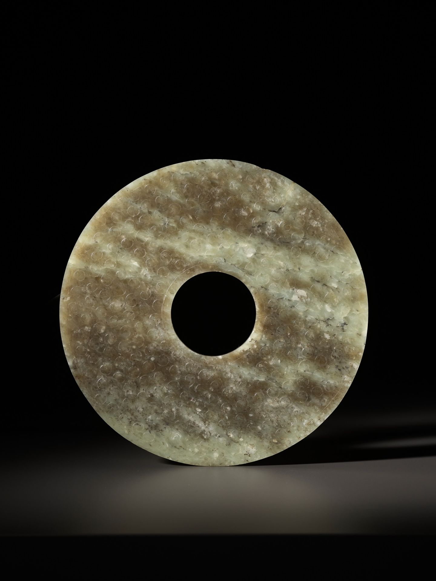 A CELADON AND BROWN JADE BI DISK, EASTERN ZHOU TO WARRING STATES PERIOD - Image 2 of 16