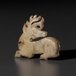 A JADE 'DEER' PENDANT, WESTERN ZHOU DYNASTY