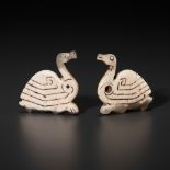 AN EXTREMELY RARE PAIR OF JADE 'GEESE' PENDANTS, SHANG DYNASTY