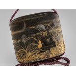 A VERY RARE THREE-CASE TOGIDASHI LACQUER INRO DEPICTING A KITSUNE LURED INTO A FOX TRAP