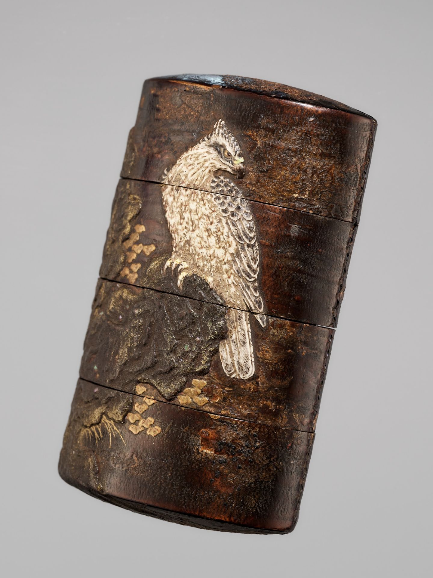 A FINE RITSUO-STYLE CHERRY-BARK AND CERAMIC-INLAID THREE-CASE LACQUER INRO WITH A HAWK AND SPARROW