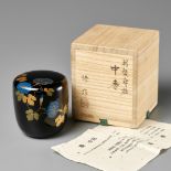 TANAKA OSAMU: A BLACK LACQUER NATSUME (TEA CADDY) WITH MORNING GLORY