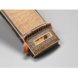 A FINE AND RARE LACQUERED AND INLAID PAULOWNIA WOOD MINIATURE KOTO