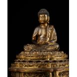 A GILT LACQUERED WOOD FIGURE OF AMIDA NYORAI, EDO