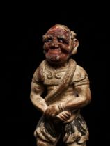 A RARE POLYCHROME WOOD FIGURE OF AN ONI WITH SNAKE, LATE MUROMACHI TO EARLY EDO