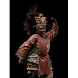 A POLYCHROME WOOD FIGURE OF BASARA TAISHO (DOG GENERAL), LATE MUROMACHI TO EDO