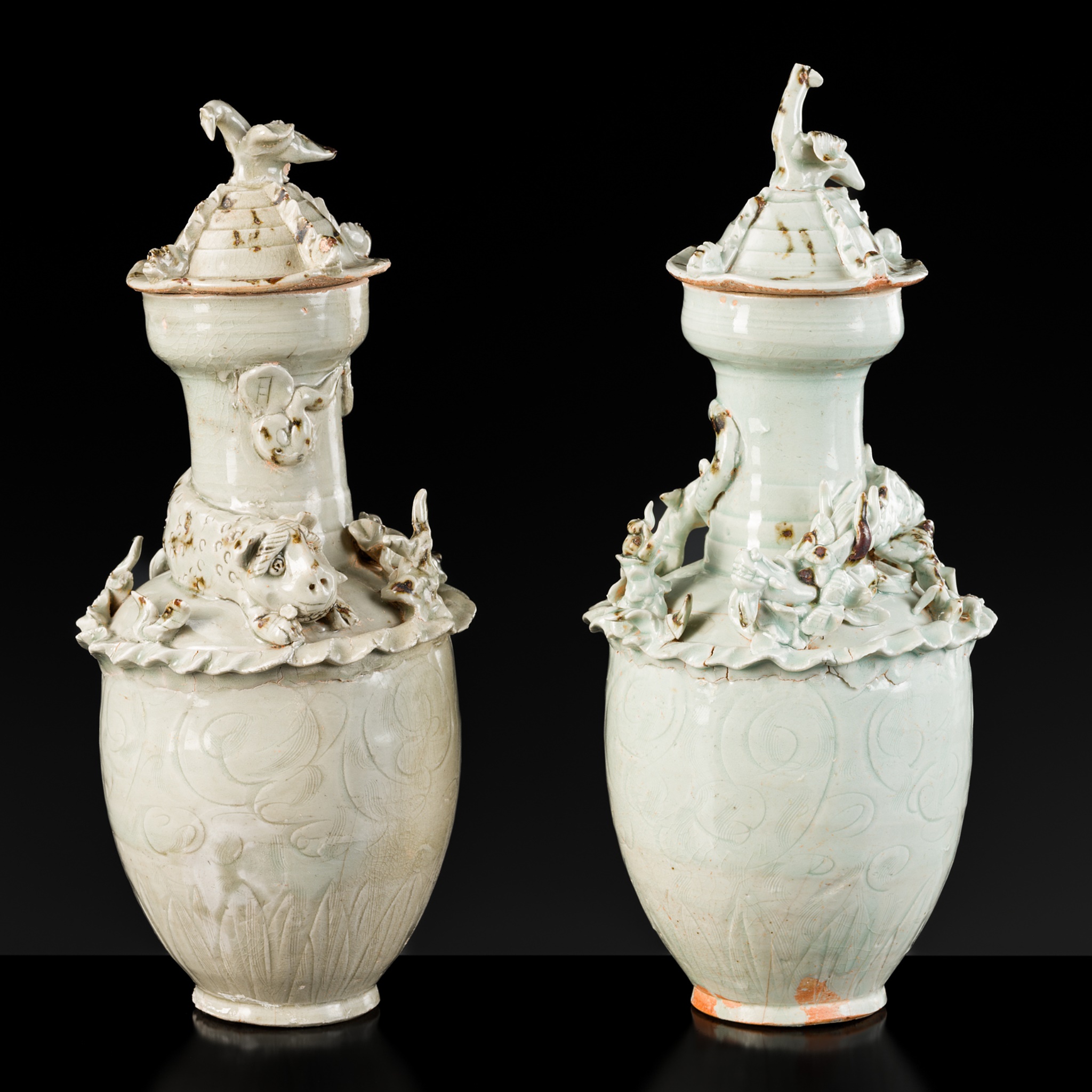 A PAIR OF QINGBAI FUNERARY JARS AND COVERS, SONG DYNASTY
