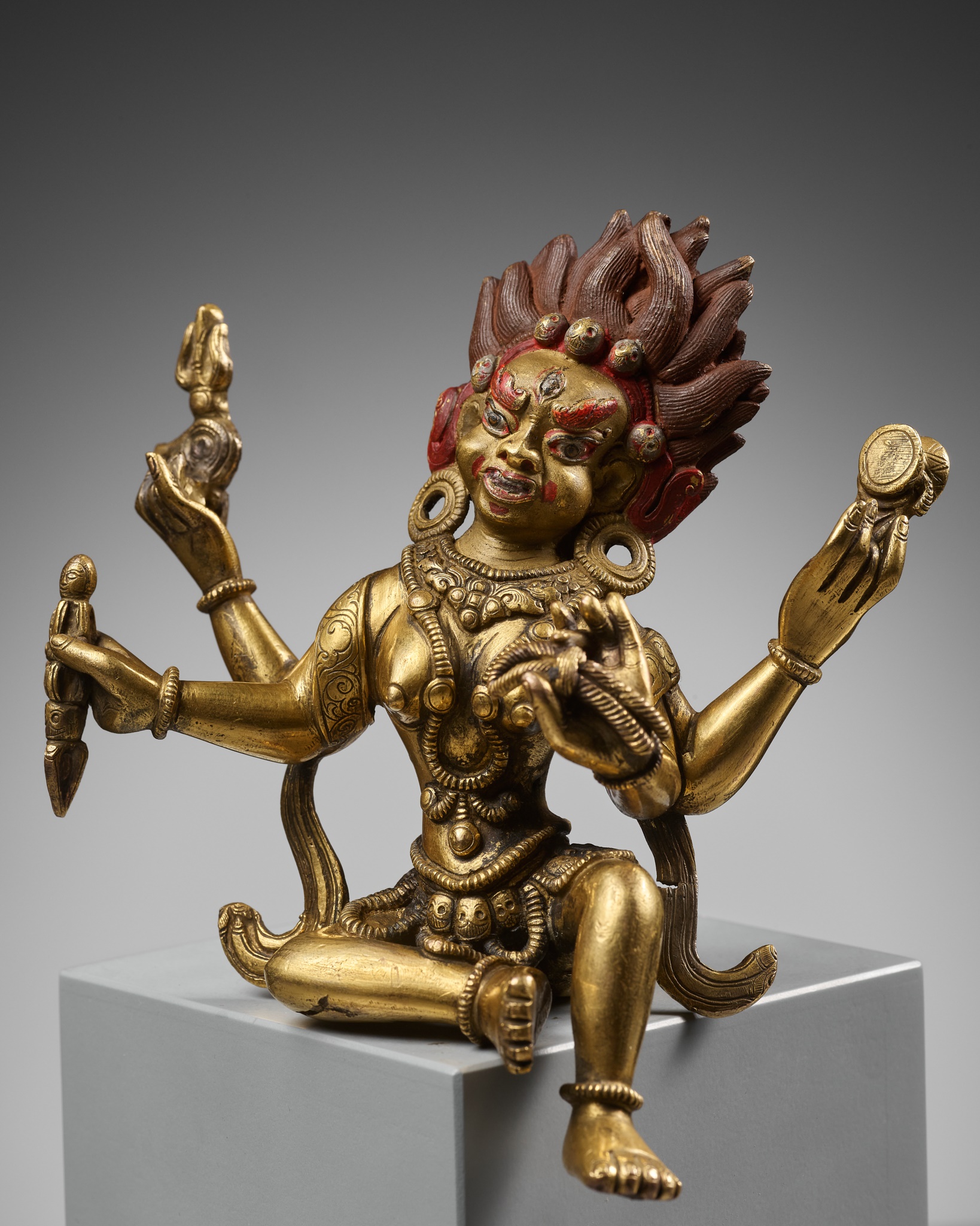 A GILT BRONZE FIGURE OF PALDEN LHAMO, 17TH-18TH CENTURY