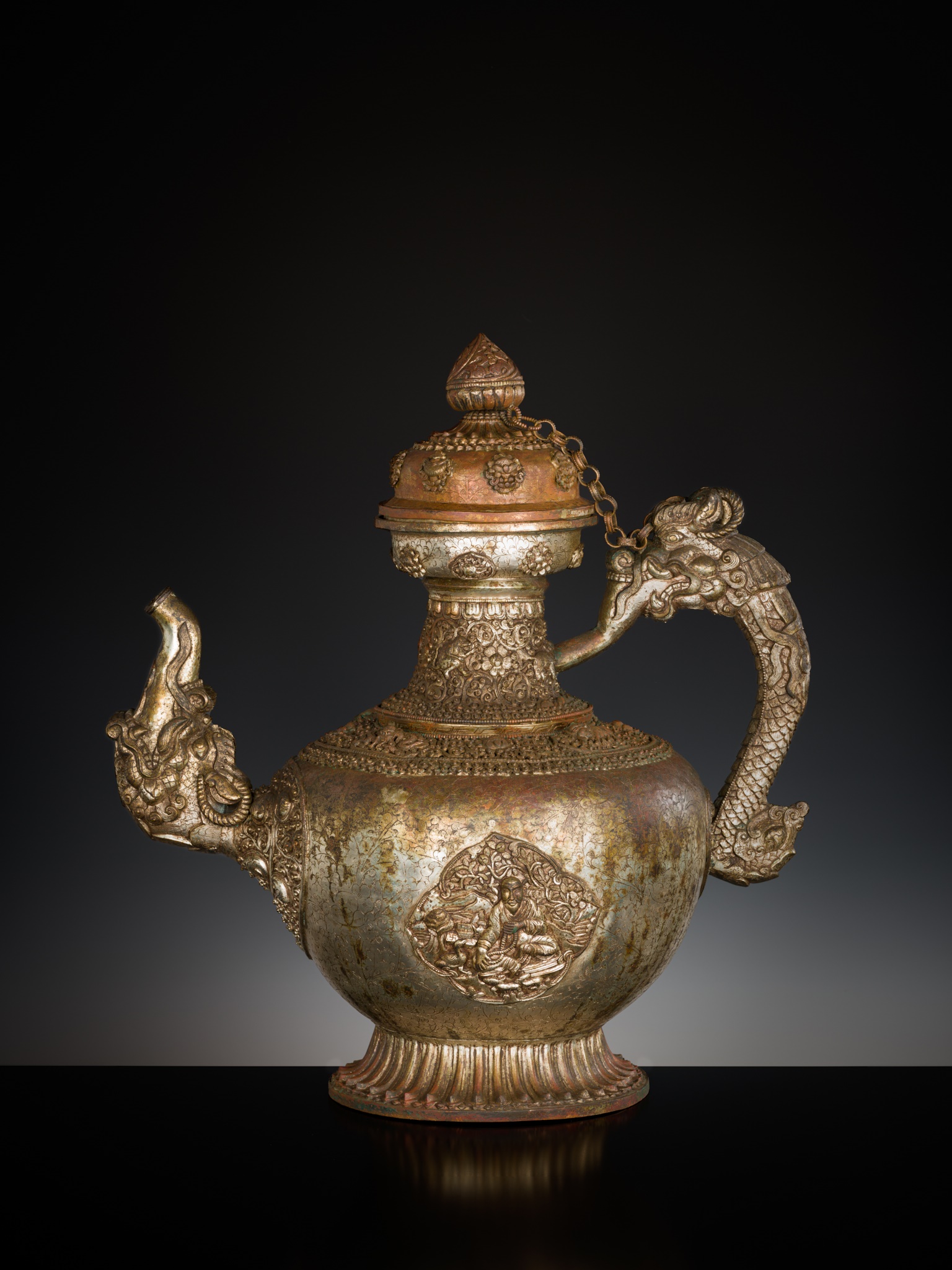 A MASSIVE SILVERED-COPPER RITUAL TEAPOT AND COVER, TIBET, 19TH CENTURY - Image 10 of 15