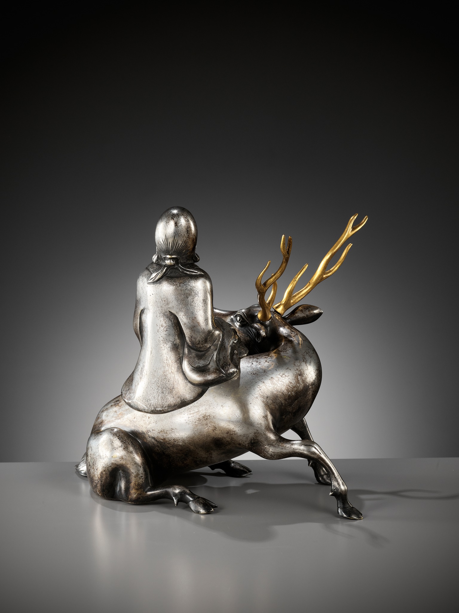 A SILVERED AND GILT BRONZE 'SHOULAO AND DEER' INCENSE BURNER, QING DYNASTY - Image 9 of 14