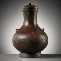 A COPPER-INLAID BRONZE RITUAL WINE VESSEL AND COVER, HU, EASTERN ZHOU DYNASTY