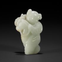 A PALE CELADON FIGURE OF A BOY WITH A HOBBY HORSE, 18TH CENTURY