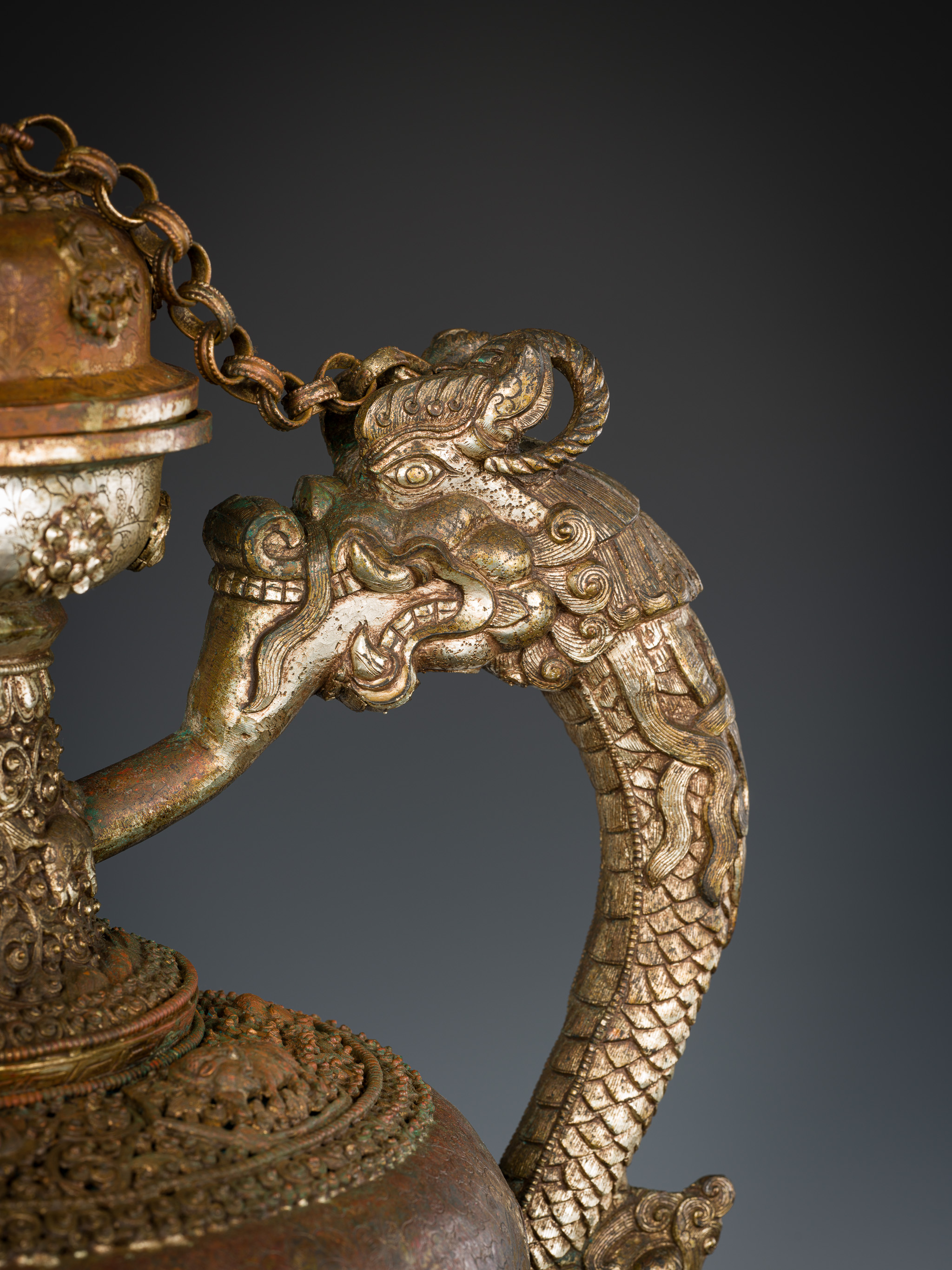 A MASSIVE SILVERED-COPPER RITUAL TEAPOT AND COVER, TIBET, 19TH CENTURY - Image 4 of 15