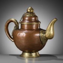 A LARGE BRASS AND COPPER RITUAL TEAPOT