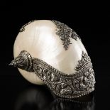 A REPOUSSE SILVER-MOUNTED RITUAL CONCH