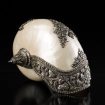 A REPOUSSE SILVER-MOUNTED RITUAL CONCH