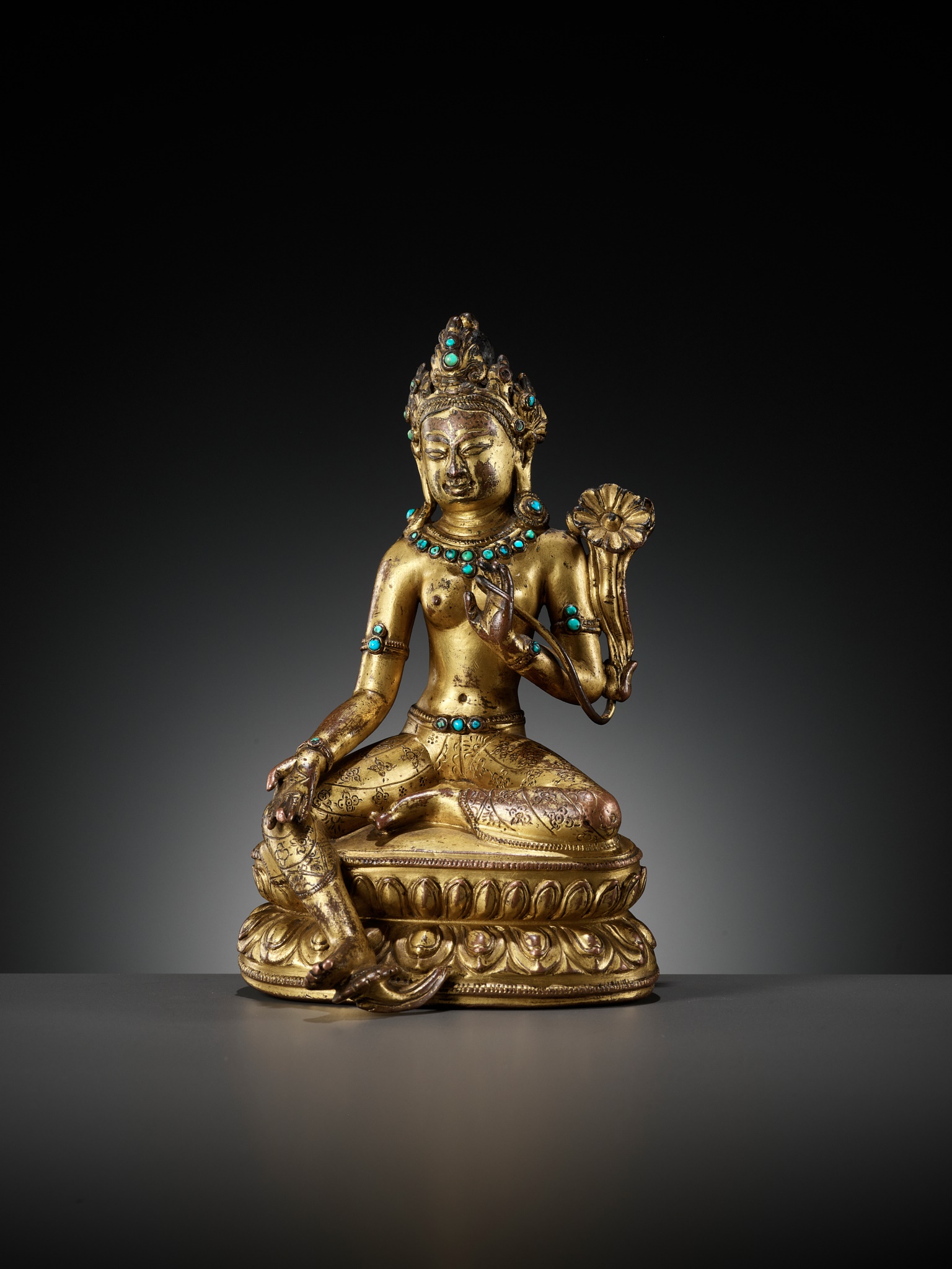 A GILT AND TURQUOISE-INLAID COPPER ALLOY FIGURE OF GREEN TARA, DENSATIL STYLE, TIBET, 14TH CENTURY - Image 14 of 16
