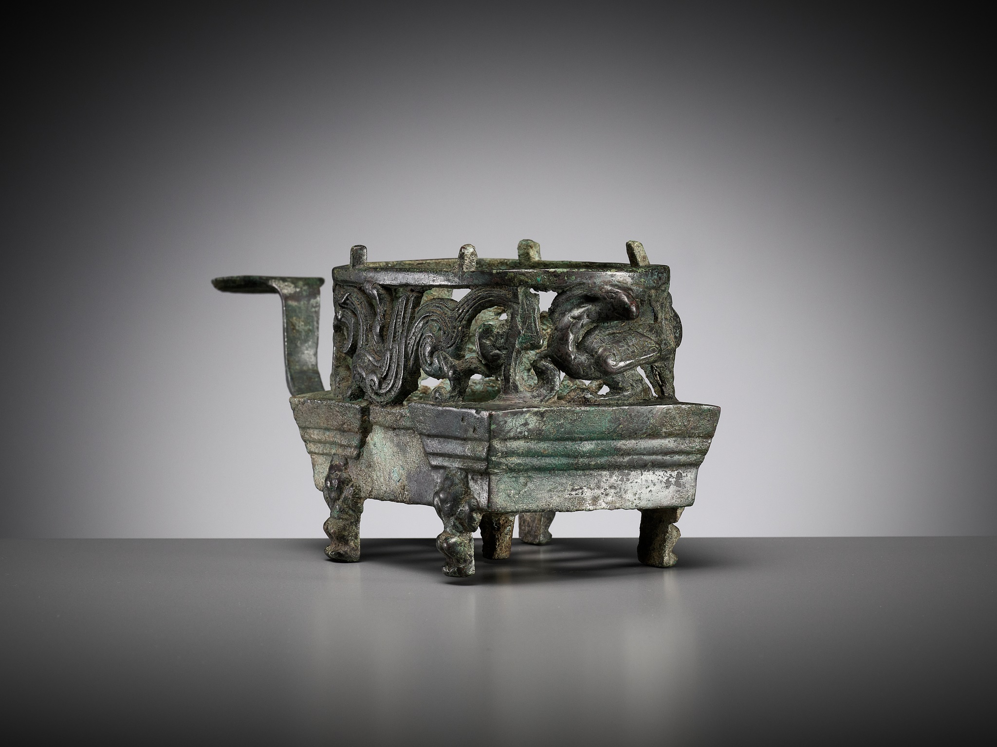 A 'FOUR AUSPICIOUS BEASTS' (SI XIANG) BRONZE BRAZIER, HAN DYNASTY, CHINA, 206 BC-220 AD - Image 11 of 16
