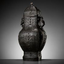 A MASSIVE AND LARGE ARCHAISTIC BRONZE VASE AND COVER, FANGHU, MING DYNASTY
