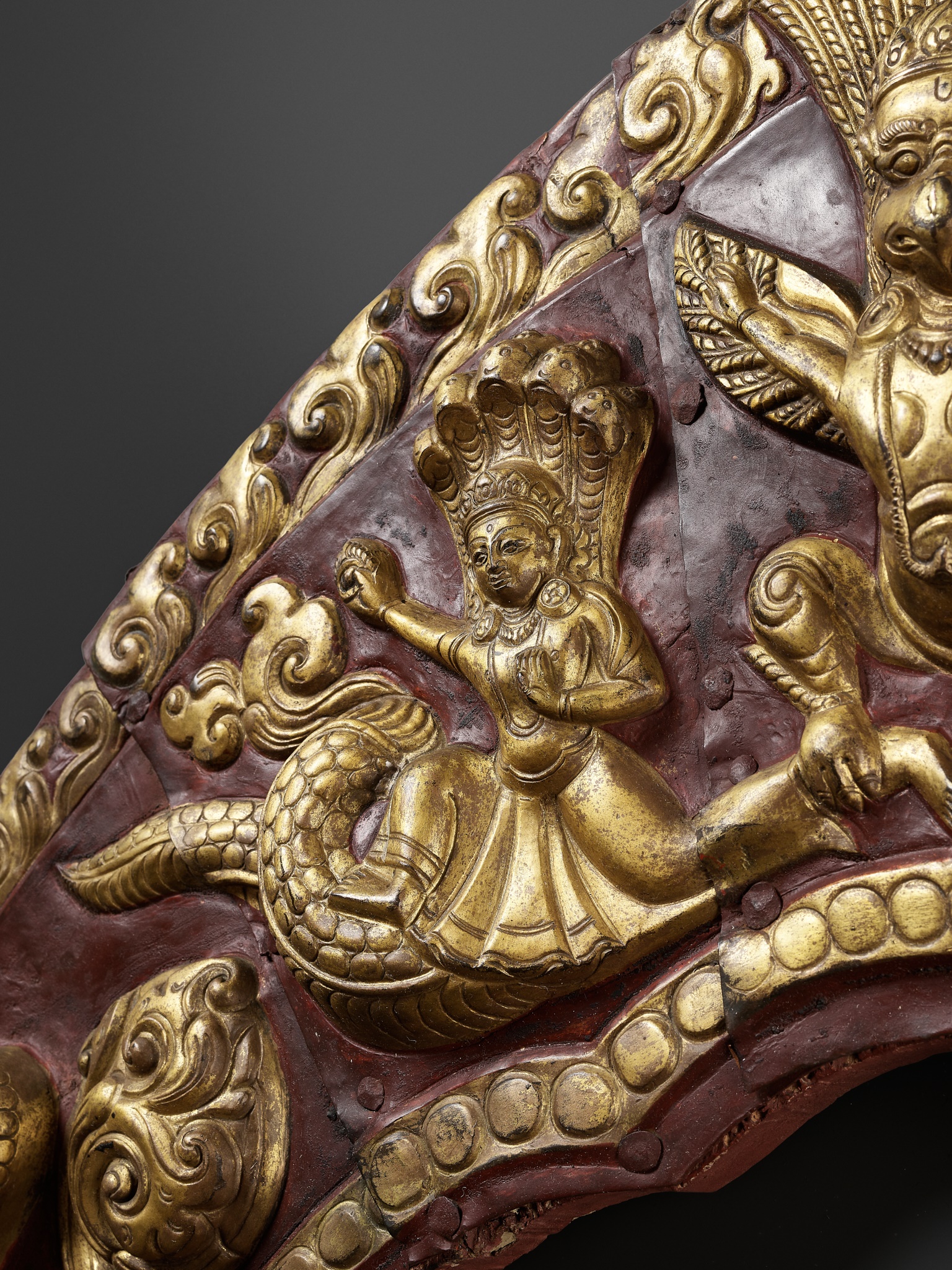 A LARGE GILT AND LACQUERED COPPER REPOUSSE TORANA, NEPAL, 17TH-18TH CENTURY - Image 6 of 9