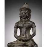 A BRONZE FIGURE OF BUDDHA, ANGKOR PERIOD, KHMER EMPIRE, 12TH CENTURY