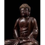 A LARGE LACQUERED WOOD FIGURE OF BUDDHA, LATE MING/EARLY QING DYNASTY, CIRCA 17TH CENTURY