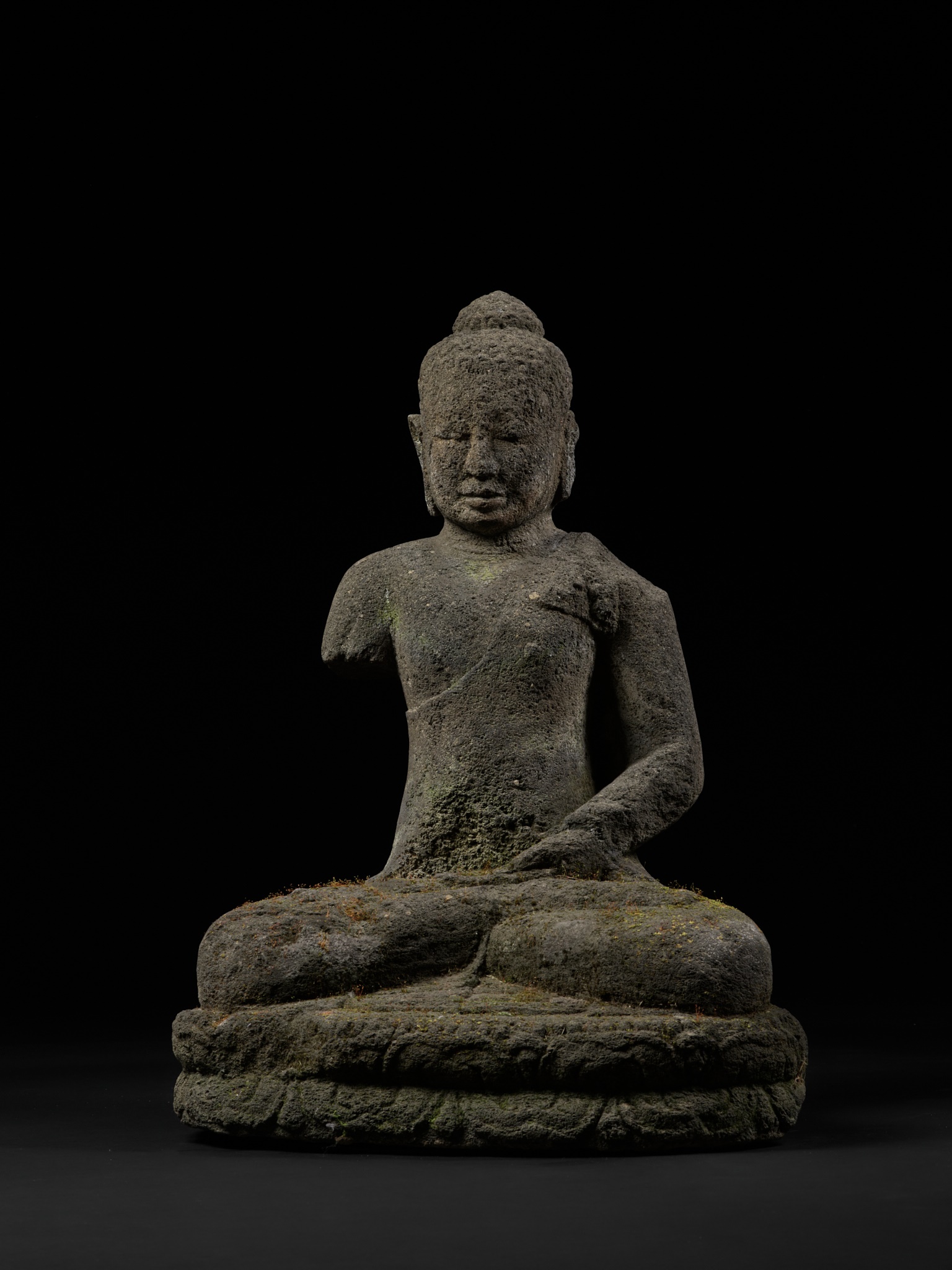 A VOLCANIC STONE FIGURE OF BUDDHA, CENTRAL JAVA, INDONESIA, FIRST HALF OF THE 9TH CENTURY - Image 2 of 14