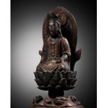 A LACQUERED WOOD FIGURE OF GUANYIN, MING DYNASTY