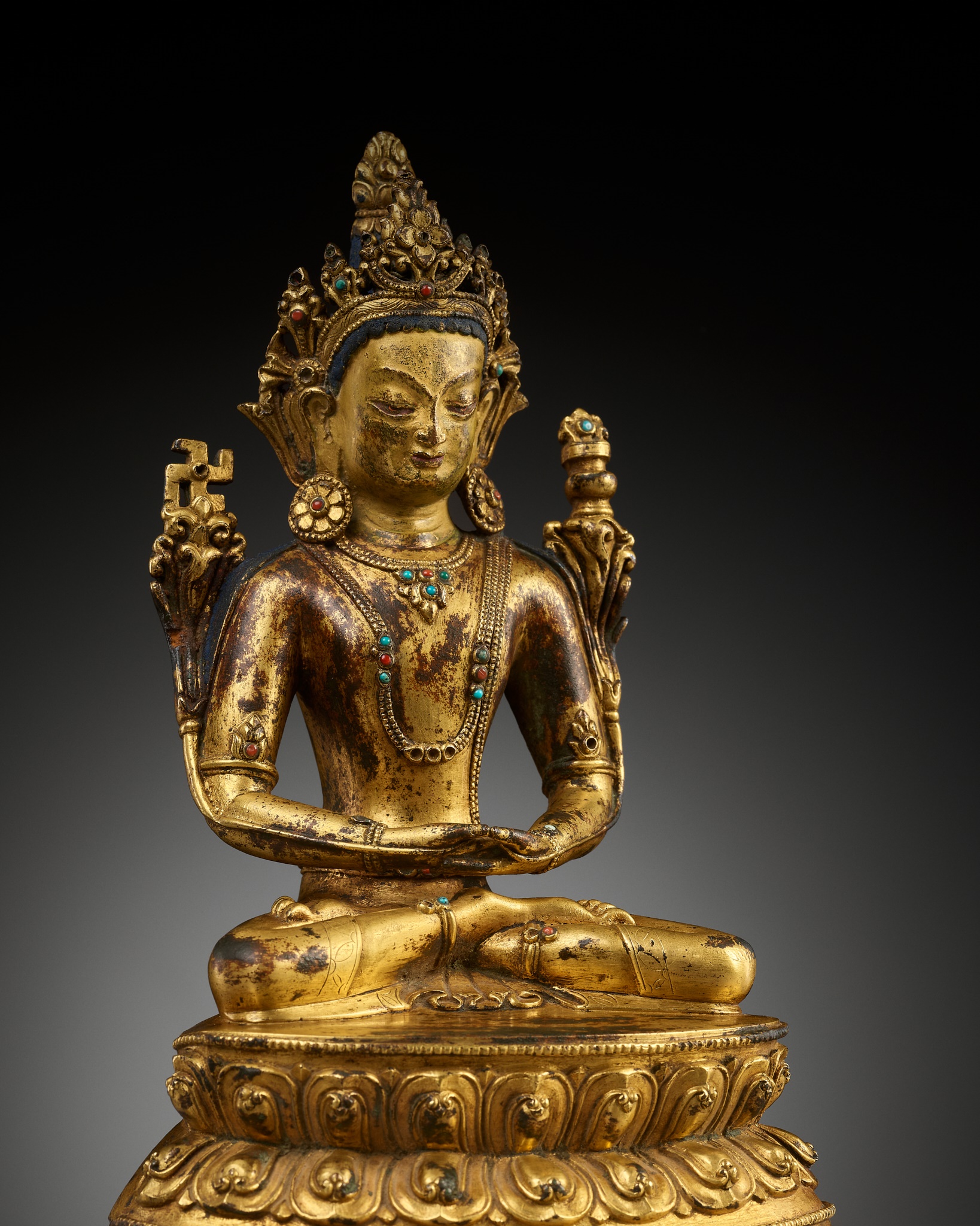 A GILT BRONZE FIGURE OF TONPA SHENRAP