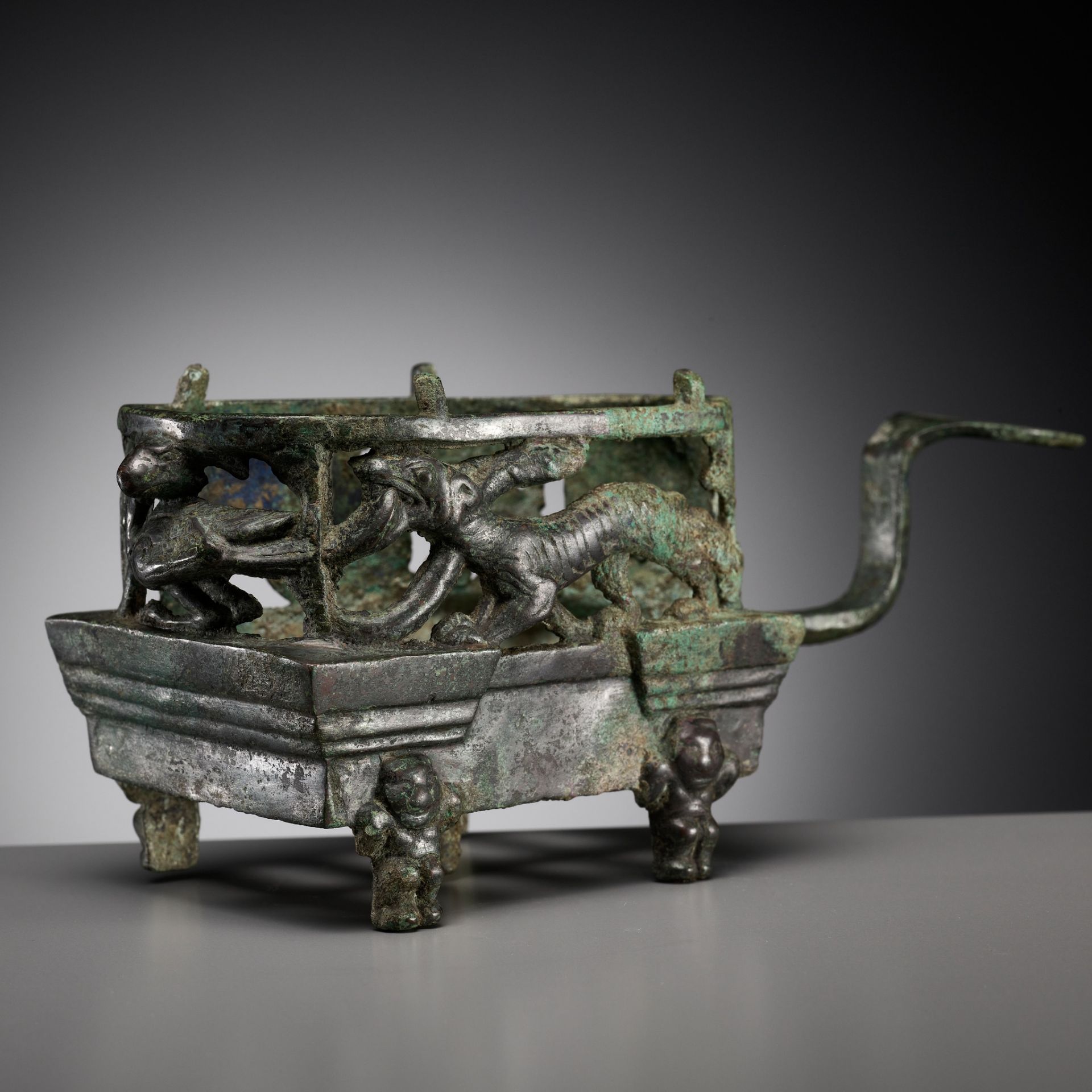 A 'FOUR AUSPICIOUS BEASTS' (SI XIANG) BRONZE BRAZIER, HAN DYNASTY, CHINA, 206 BC-220 AD