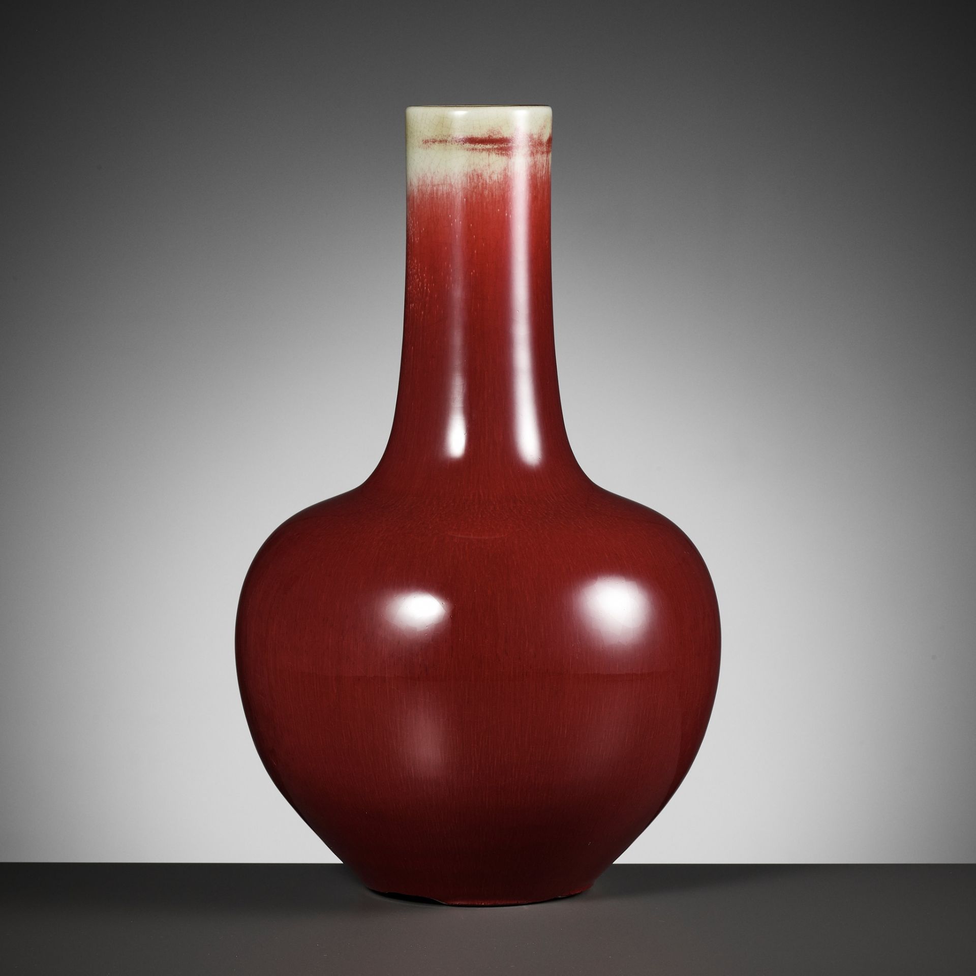 A COPPER-RED GLAZED 'LANGYAO' VASE, TIANQIUPING, QING DYNASTY