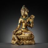 A GILT AND TURQUOISE-INLAID COPPER ALLOY FIGURE OF GREEN TARA, DENSATIL STYLE, TIBET, 14TH CENTURY