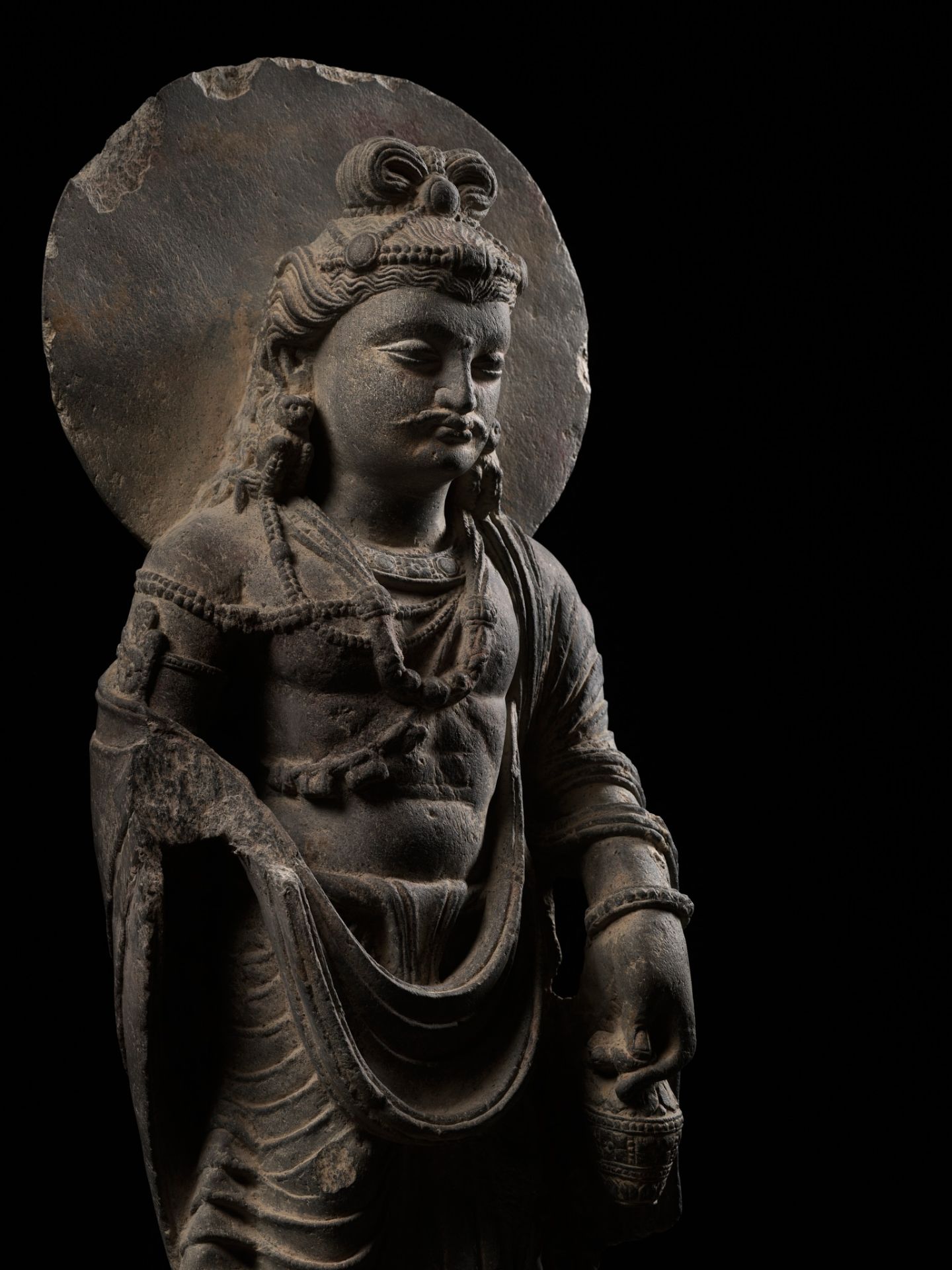 A LARGE SCHIST FIGURE OF MAITREYA WITH ATLAS, ANCIENT REGION OF GANDHARA - Image 9 of 12