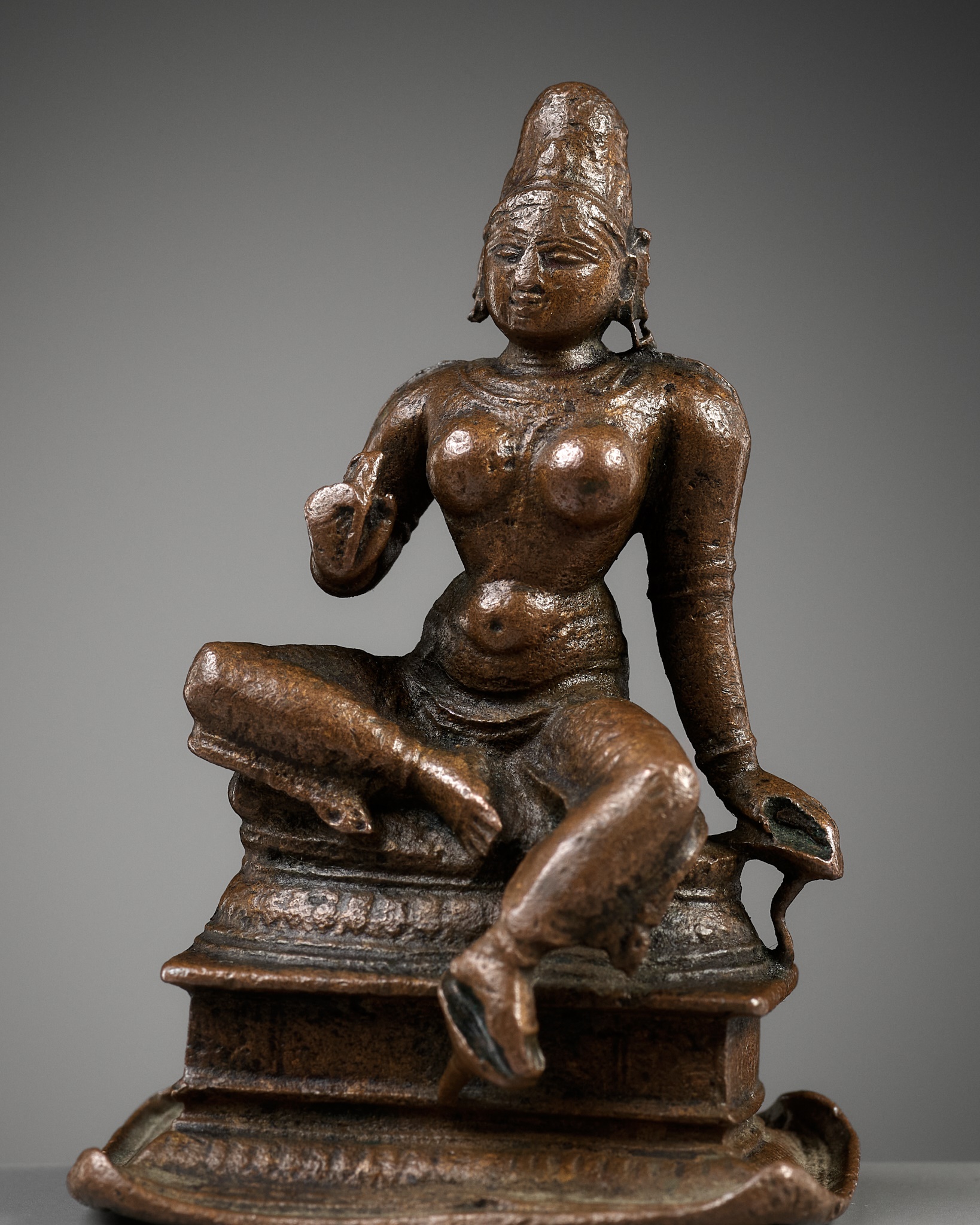 A SMALL COPPER ALLOY FIGURE OF PARVATI, LATER CHOLA