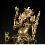 A BRONZE FIGURE OF GANESHA, SOUTH INDIA, 17TH-18TH CENTURY