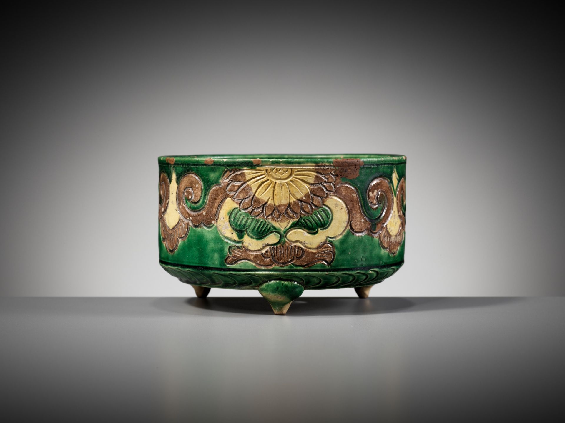 A GREEN, AUBERGINE, AND YELLOW-GLAZED TRIPOD CENSER, LIAO DYNASTY - Image 12 of 12