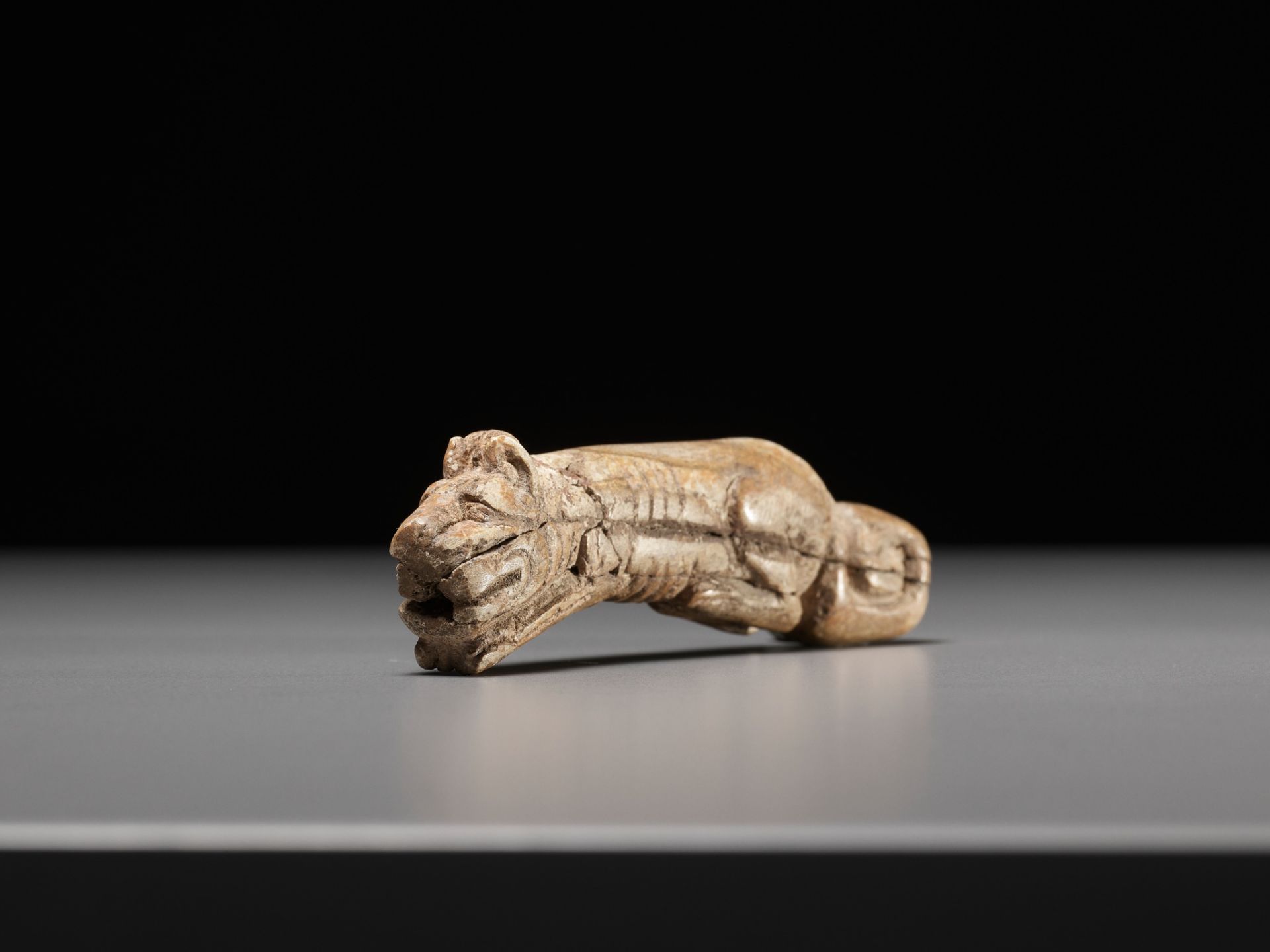 A RARE CARVED BONE FIGURE OF A TIGER, SHANG DYNASTY - Image 18 of 18