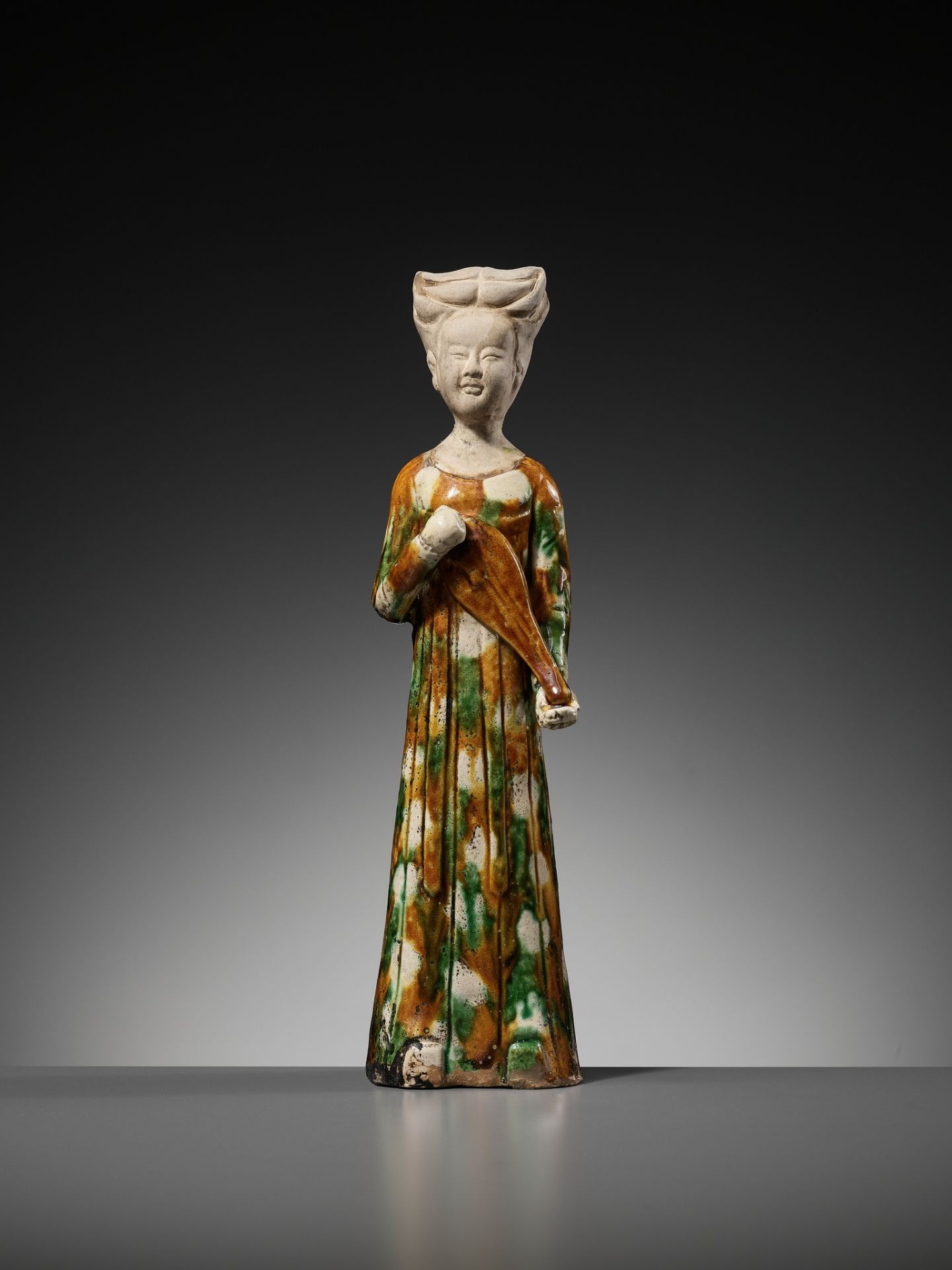 A SANCAI GLAZED POTTERY FIGURE OF A FEMALE MUSICIAN PLAYING THE PIPA, TANG DYNASTY - Image 2 of 13