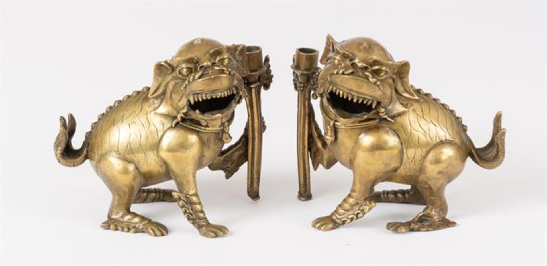 PAIR OF CHINESE FOO DOGS AS CANDLESTICKS