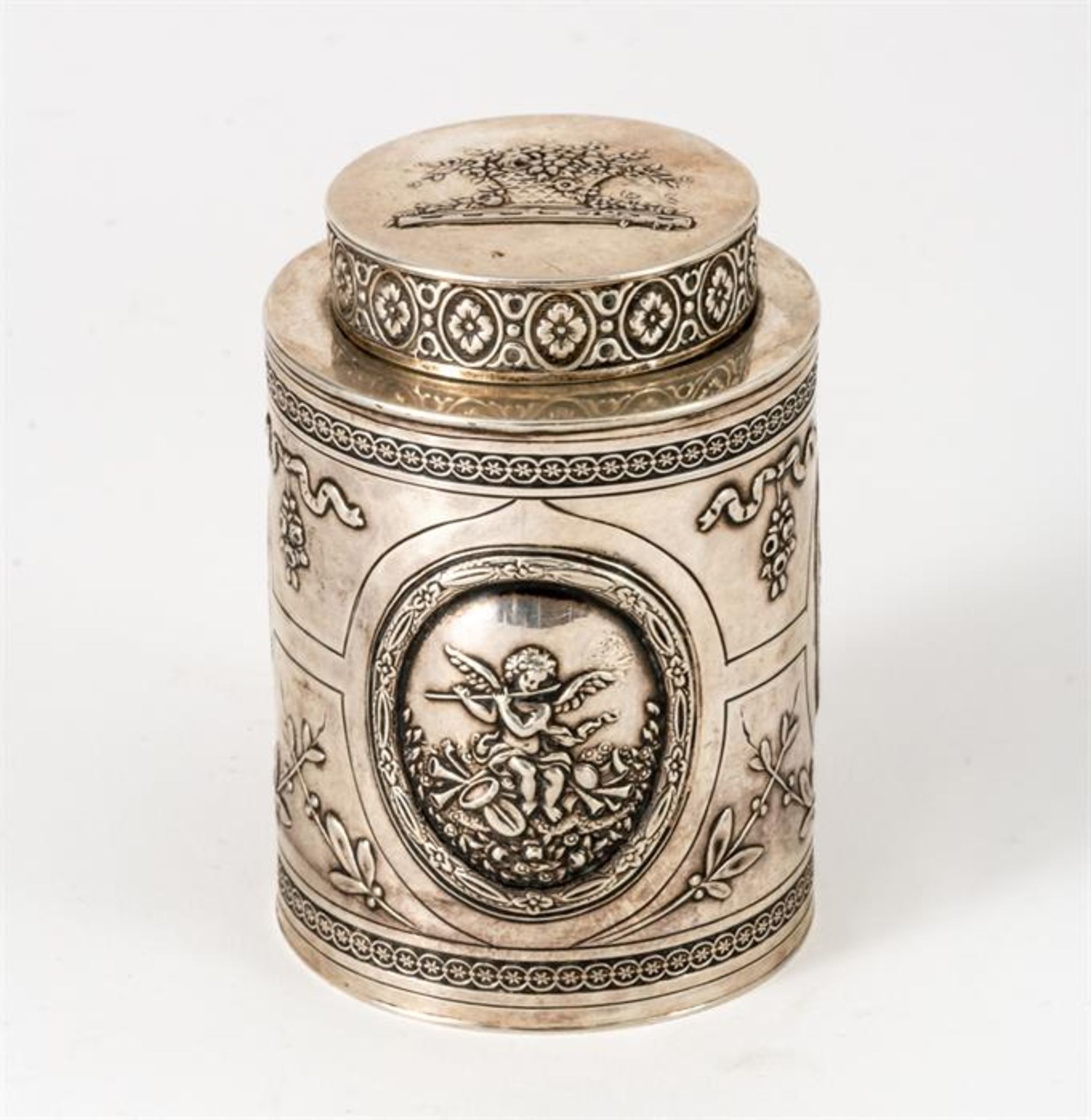 SILVER TEA BOX WITH VARIOUS PUTTI-SCENES