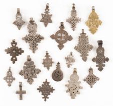 EIGHTEEN COPTIC CROSS PENDANTS