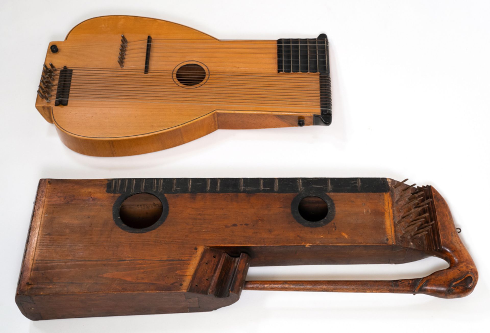 CONVOLUTE: HARP ZITHER AND STOESSEL'S BASSLUTE, 20TH CENTURY