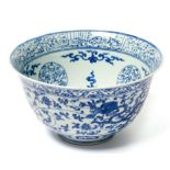 CHINESE BLUE AND WHITE PORCELAIN BOWL WITH DRAGONS AND FLORAL DECOR