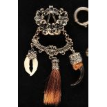 Silver jewelry chatelaine, richly decorated, with various pendants