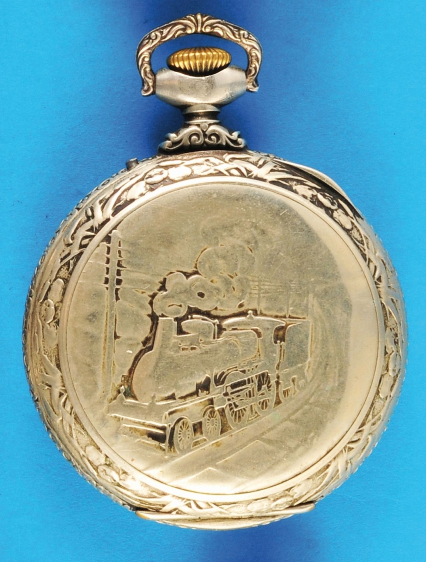 Large Doxa motif pocket watch with steam locomotive, bezels worked in relief with floral decoration