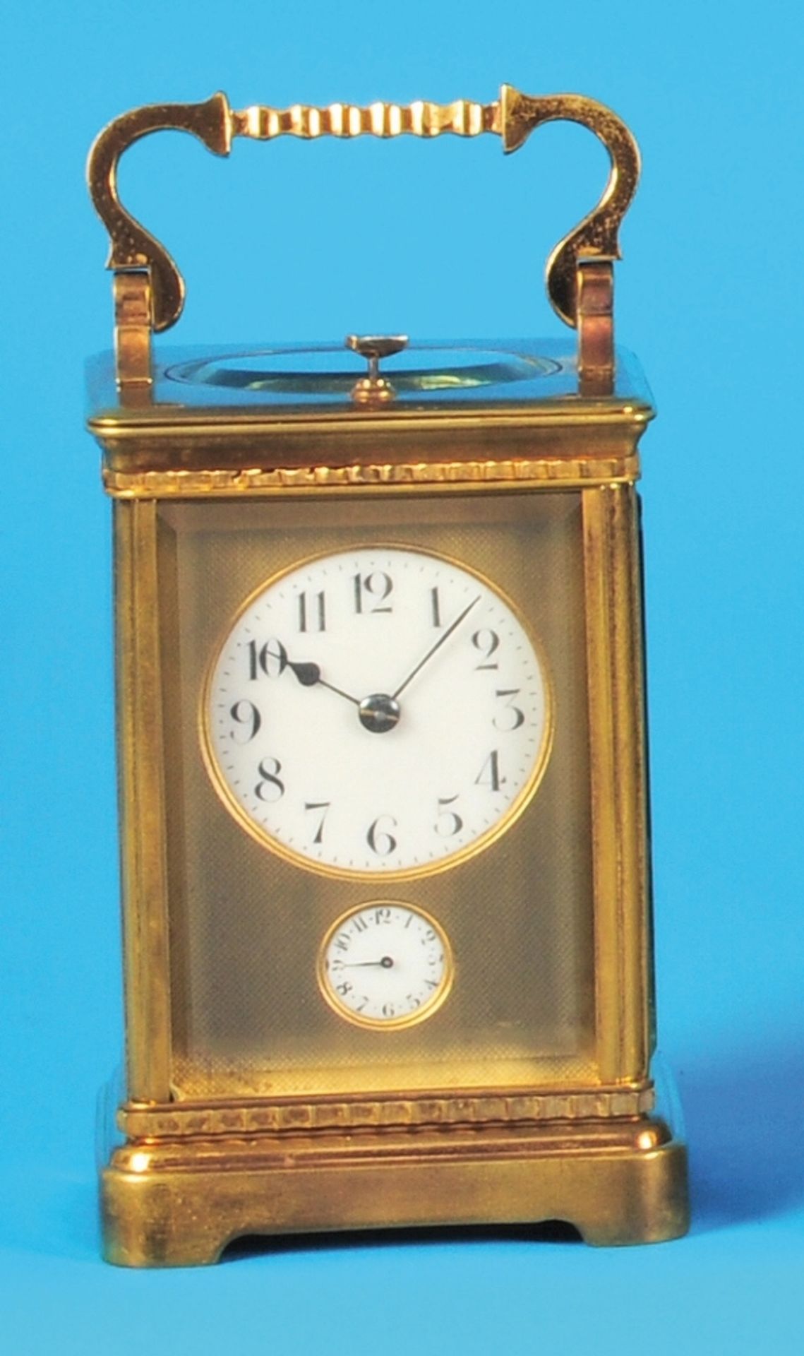 All around glazed travel clock with 4/4 hour self-strike on 2 tone springs and ¼-repeater, all aroun